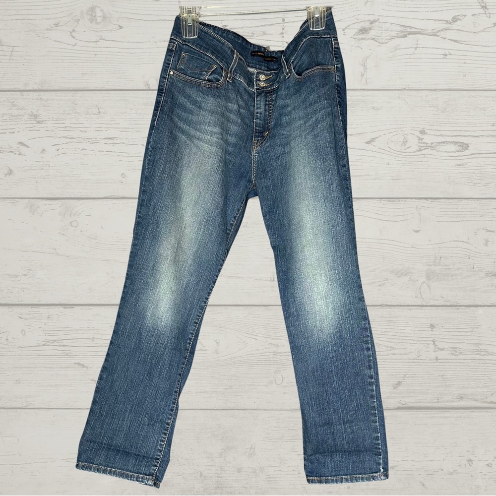 Levi’s • Mid Rise Skinny Ankle Jeans Mid Wash